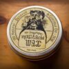 Moustache wax tin